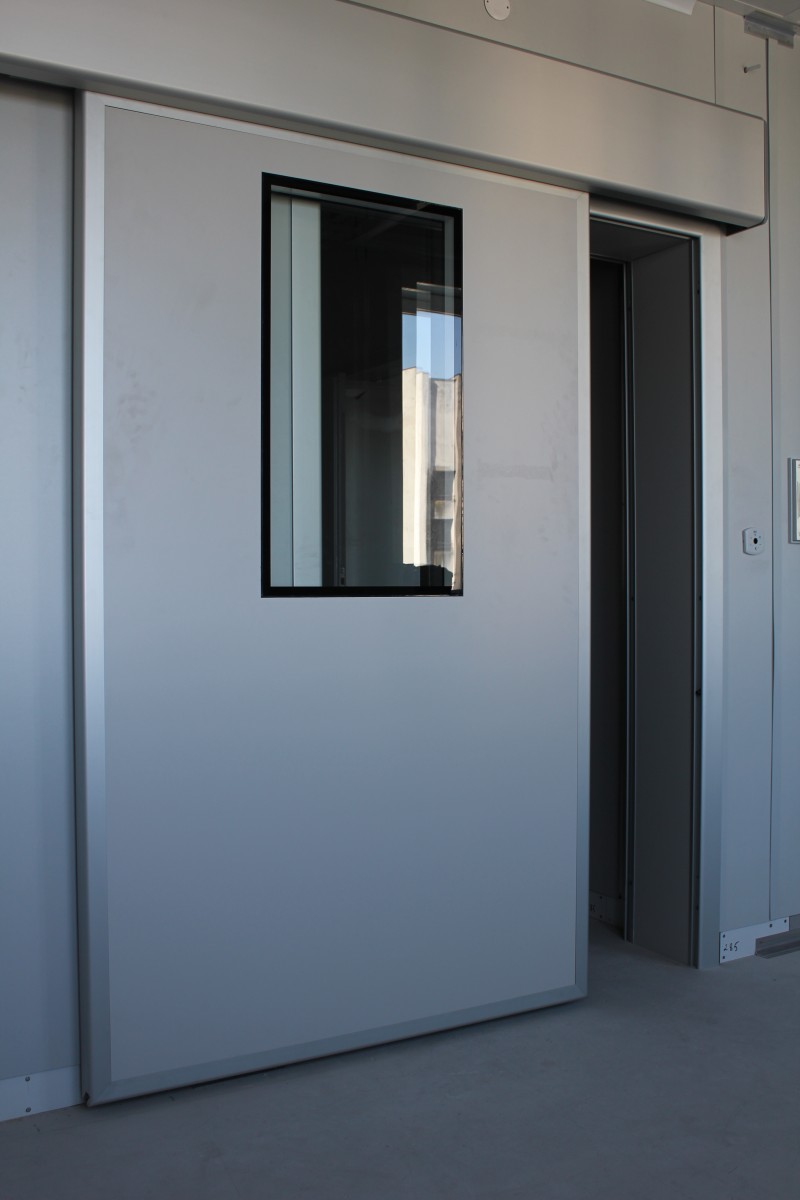 RECORD Automataajtók Kórházi rozsdamentes ajtó ablakkal